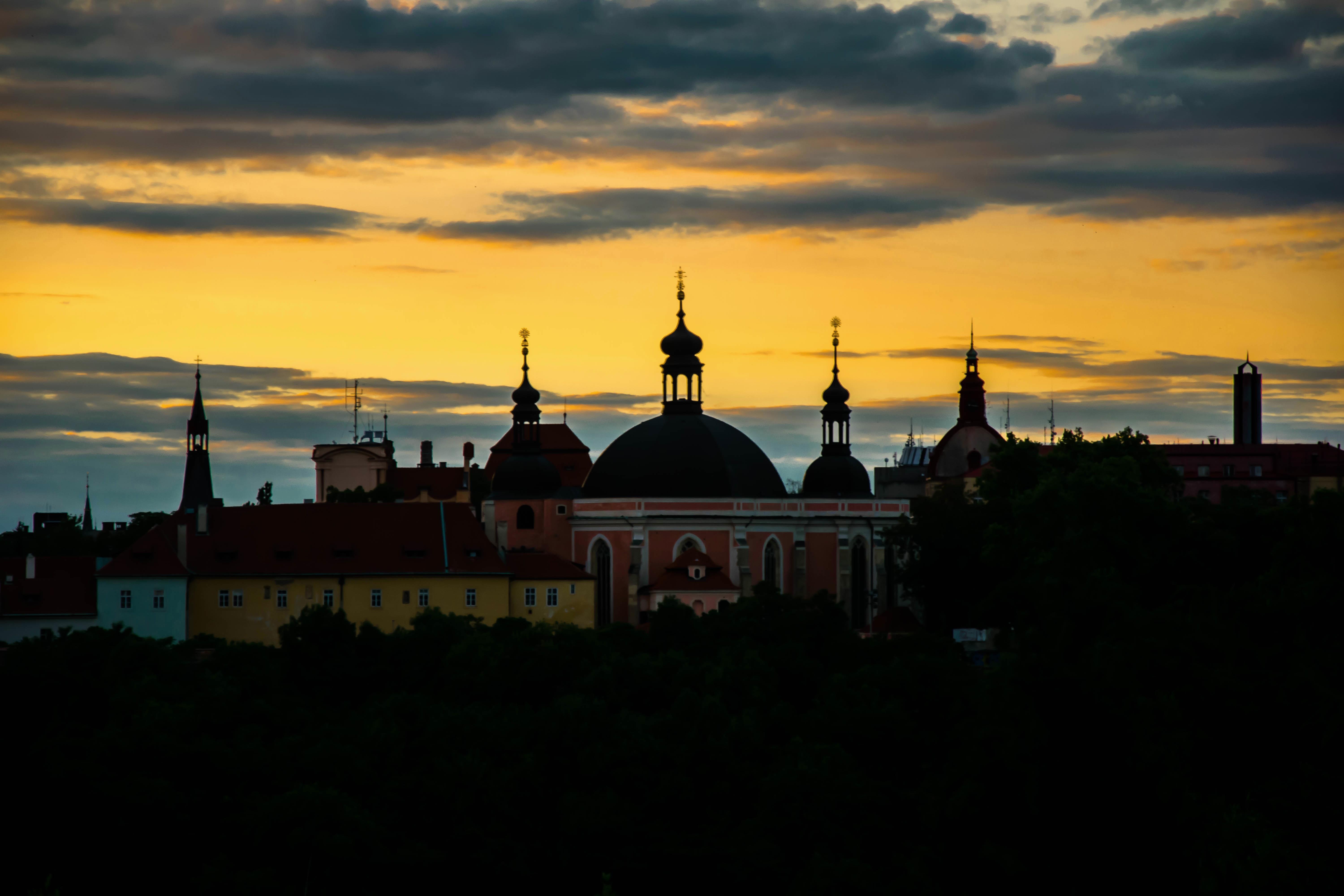 As twilight's embrace descends, shadows dance on the horizon's edge twilight